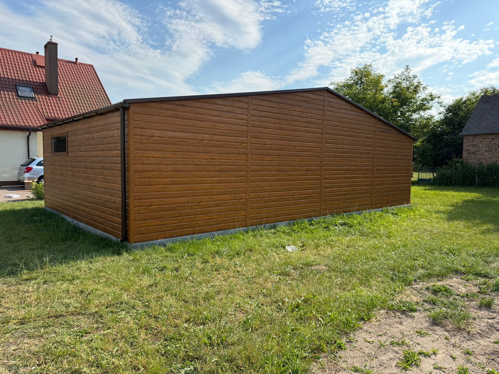 Fahatású garázs szekcionált kapuval 10 m x 6 m ID-S03